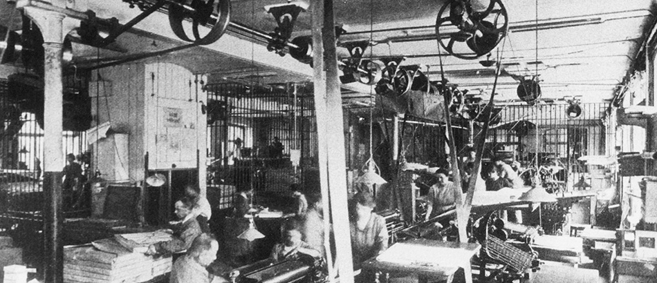 Locaux d’une fabrique, vraisemblablement une imprimerie, env. 1900-1920. Archives sociales suisses, Zurich.
