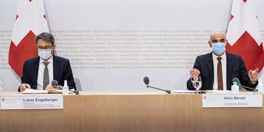 Coronavirus Suisse: Conférence de presse du 20 février 2021, du conseiller fédéral Alain Berset et du président du GDK, Lukas Engelberger. Source: Keystone.